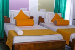 מיטה או מיטות בחדר ב-Summer Will Resort
