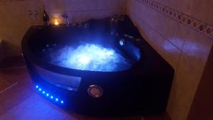 Фотография из галереи Chambre bohème avec balnéo в городе Miramont-dʼAstarac