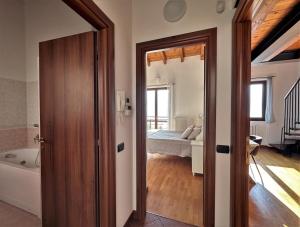 Postel nebo postele na pokoji v ubytování Chiaro di Luna Home – Lake Como