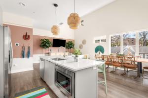 a kitchen with a sink and a counter top at Mason Lofts at West End in Nashville