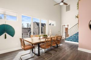 a dining room with a table and chairs at Mason Lofts at West End in Nashville