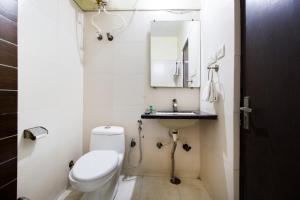 Ένα μπάνιο στο Sunshine Residency Castle Pvt Ltd +8 φωτογραφίες