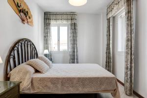 Postel nebo postele na pokoji v ubytování Apartamento Mercedes