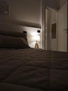 Кровать или кровати в номере My Suite Fiuggi