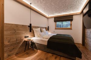 Krevet ili kreveti u jedinici u okviru objekta Hotel Leitenhof 4 Sterne Superior