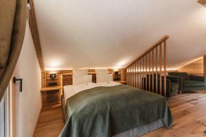 Krevet ili kreveti u jedinici u okviru objekta Hotel Leitenhof 4 Sterne Superior
