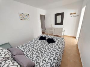 Łóżko lub łóżka w pokoju w obiekcie Casa DamiAnna - Pool - WiFi - FuerteventuraBay