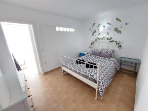 Łóżko lub łóżka w pokoju w obiekcie Casa DamiAnna - Pool - WiFi - FuerteventuraBay