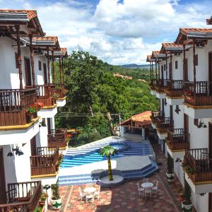 Utsikt över poolen vid HOTEL Alejandria Barichara eller i närheten