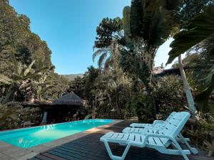 A piscina localizada em Pousada Recanto das Estrelas ou nos arredores