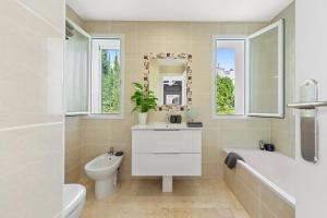 Łazienka w obiekcie Cozy Townhouse Selwo