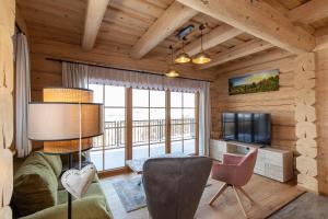 TV a/nebo společenská místnost v ubytování Biochalet Haus 1