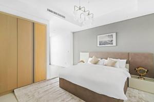 StoneTree - Paramount Tower Hotel&Residences 2 BR - Amazing View 객실 침대