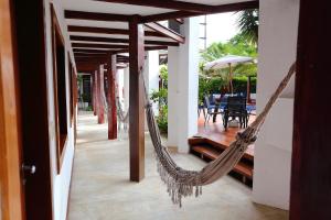 En balkon eller terrasse på Flamingo Beach - Rede Soberano