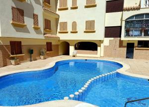 Bazén v ubytovaní Apartament Casa Milo playa Los Locos alebo v jeho blízkosti