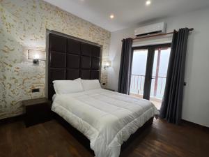 Letto o letti in una camera di Hotel Victoria