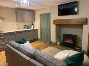 Η κουζίνα ή μικρή κουζίνα στο The Ebor Suite a cosy apartment in Haworth