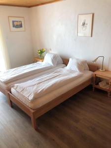 Postel nebo postele na pokoji v ubytování Hotel Restaurant Heidihof