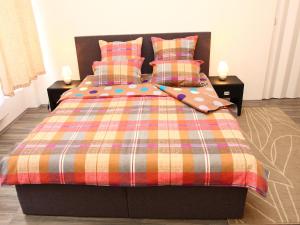 Postel nebo postele na pokoji v ubytování Apartments Mikovec