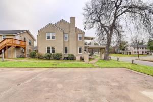 a large house with a tree in front of it at Waco Vacation Rental about 2 Mi to Magnolia Market! in Waco