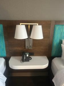 a telephone on a table in a hotel room at Hampton Inn By Hilton Kingston in Kingston