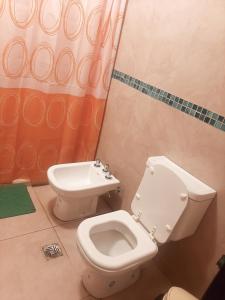 a bathroom with a toilet and a bidet at Apartamentos Naomi 1B in El Carmen