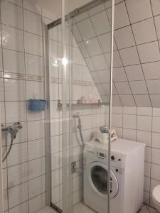 Koupelna v ubytování Ostseeträume + 17 fotografií