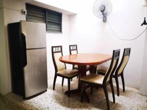Η κουζίνα ή μικρή κουζίνα στο AlFateh Homestay Alor Setar