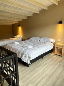 Uma cama ou camas num quarto em Patagonia LiFe Rentals