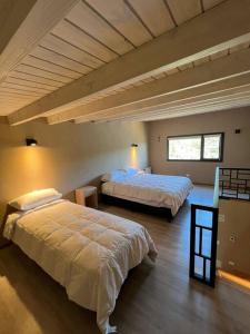 Uma cama ou camas num quarto em Patagonia LiFe Rentals