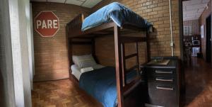 Ένα ή περισσότερα κρεβάτια σε δωμάτιο στο Rancho da Vovó Cleia 1 +46 φωτογραφίες