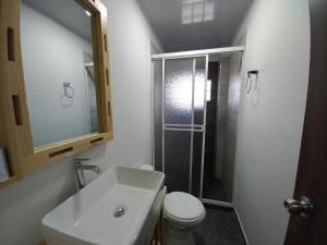 Koupelna v ubytování Hotel 42 Avenida
