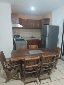 Kuchyň nebo kuchyňský kout v ubytování Comodo Departamento