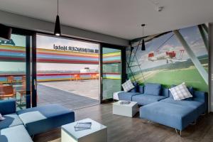 Posezení v ubytování MEININGER Hotel Berlin Airport
