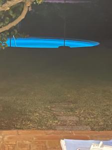 a blue surfboard sitting on top of a table at Vila sol in Armação de Pêra