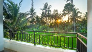 Balkón nebo terasa v ubytování Hepi Yuk Ubud Luxury Guesthouse