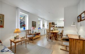 a living room with a kitchen and a dining room at Gorgeous Apartment In Randers C With Wifi in Randers