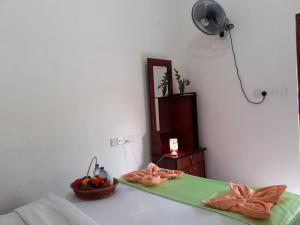 Postel nebo postele na pokoji v ubytování Subash Hotel