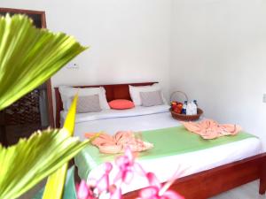 Postel nebo postele na pokoji v ubytování Subash Hotel