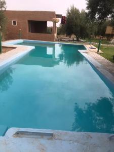 The swimming pool at or close to Walid