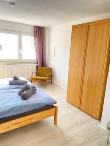 Ένα ή περισσότερα κρεβάτια σε δωμάτιο στο Ferienhaus zur Donau