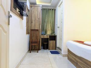 Ένα ή περισσότερα κρεβάτια σε δωμάτιο στο Hotel Feathers