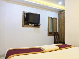 TV a/nebo společenská místnost v ubytování Hotel Feathers