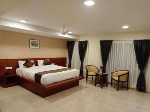 Voodi või voodid majutusasutuse CLIFFVIEW RESORT toas