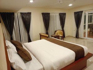 Voodi või voodid majutusasutuse CLIFFVIEW RESORT toas