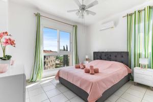 Postel nebo postele na pokoji v ubytování Penthouse Carina