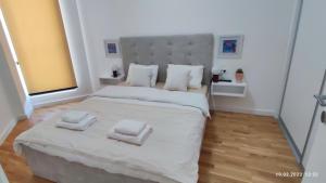 Postel nebo postele na pokoji v ubytování Apartments LORA in Bonila