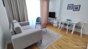 TV a/nebo společenská místnost v ubytování Apartments LORA in Bonila