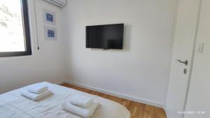 Postel nebo postele na pokoji v ubytování Apartments LORA in Bonila