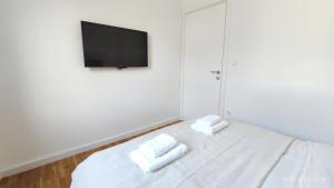 Postel nebo postele na pokoji v ubytování Apartments LORA in Bonila